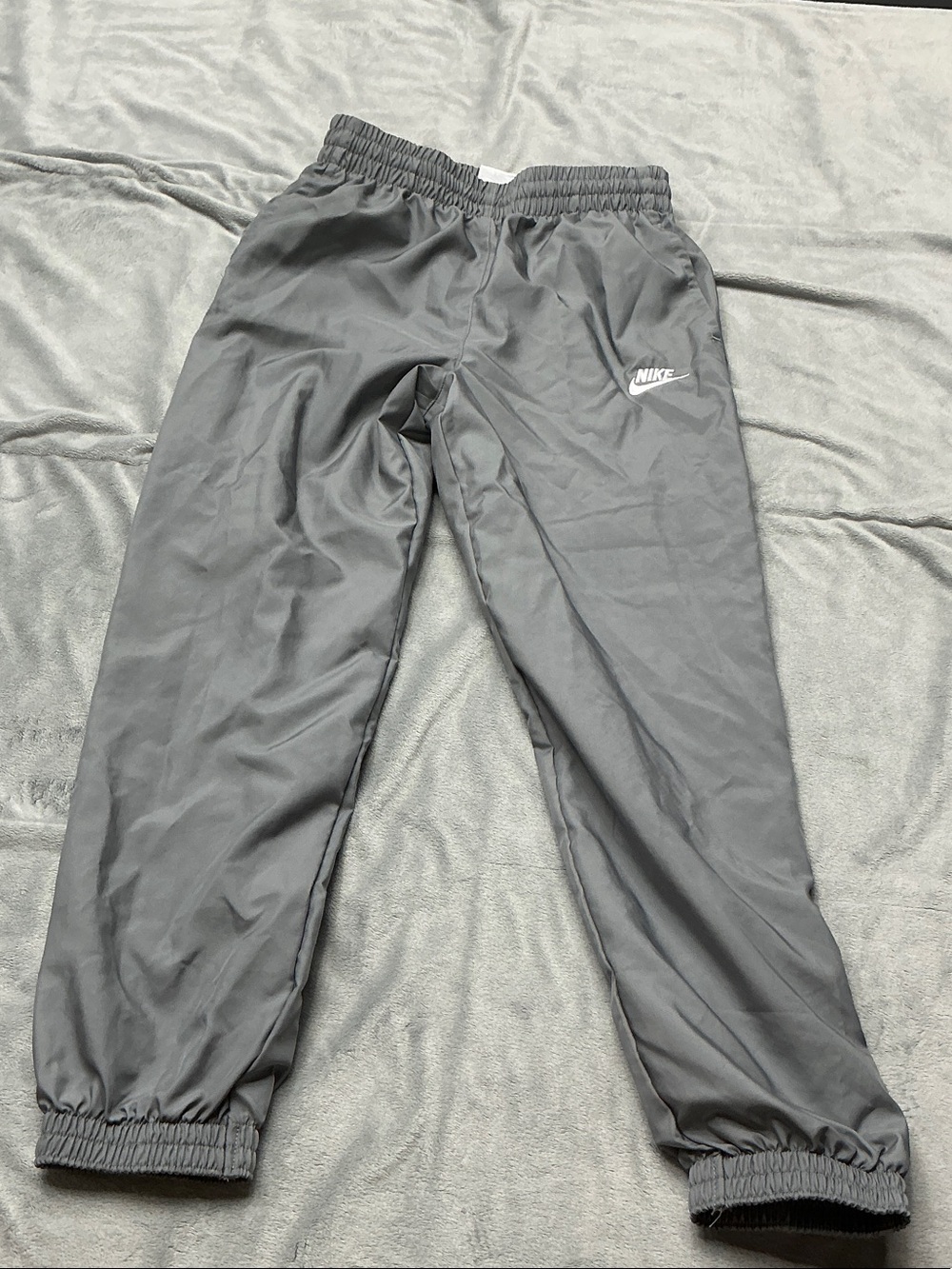 Nike Kids Gray Track Joggers with White Swoosh